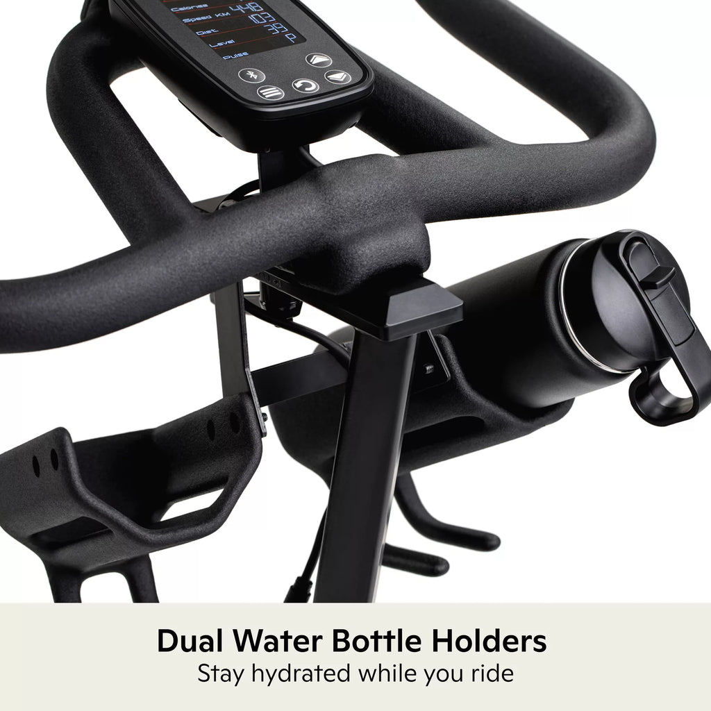 Schwinn IC4 Indoor Cycling Bike with 100 Resistance Levels, Bluetooth Heart Rate Armband, Dual-Sided SPD Pedals, Compatible with Peloton App, Zwift and JRNY, Backlit LCD Console, 4-Way Adjustable Handlebars, Includes 3 lb Dumbbells